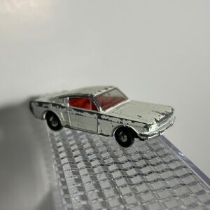 Vintage Lesney Matchbox No. 8 Ford Mustang Fastback diecast toy car.
